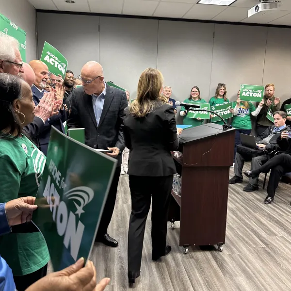 President Lee Saunders greets Dr. Amy Acton